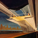 Illustration for article titled I Want to Live Inside This 1960 Painting of a Monorail Station